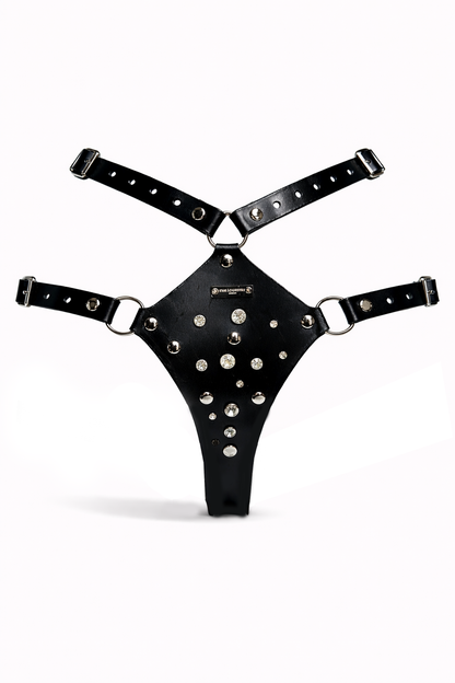 Black leather thong with studs on a white background