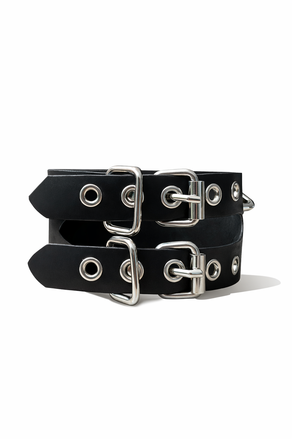 Two black leather collars with silver metal rings on a white background