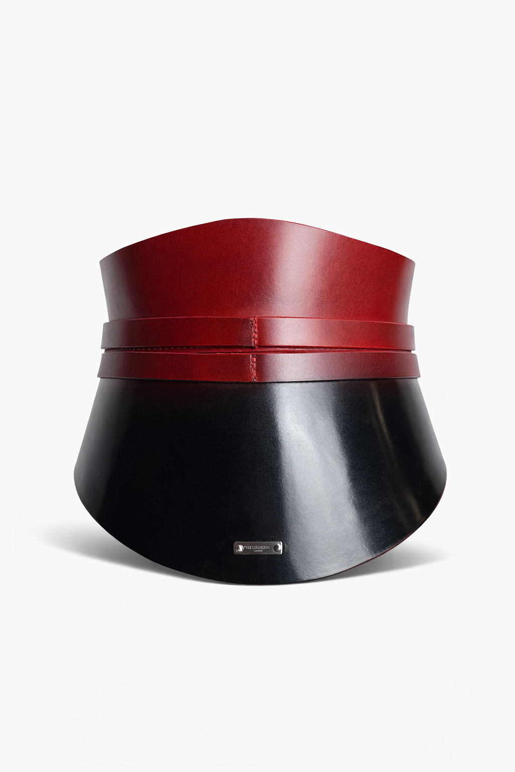 Black and red leather belt on a white background