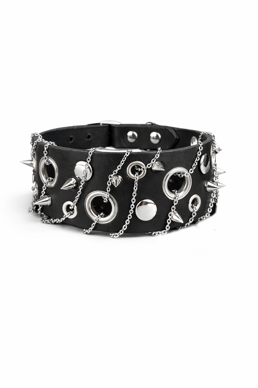 Black leather choker with silver spikes, chains, and circular embellishments on a white background